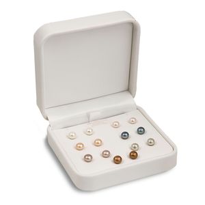 Seven pairs of 6-7mm Cultured Freshwater Pearl studs in multiple colors. Set in Sterling Silver